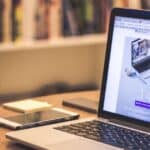small business owner reviewing WordPress site to avoid ignoring WordPress maintenance consequences