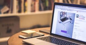 small business owner reviewing WordPress site to avoid ignoring WordPress maintenance consequences